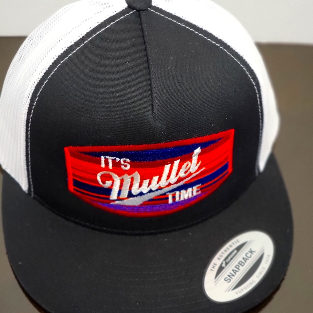 Yupoong flatbill snapback.  It's Mullet time.